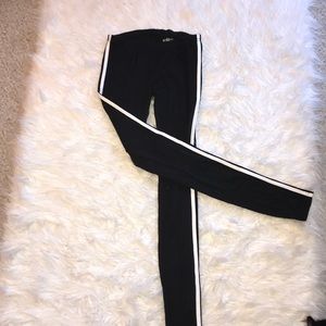 Black leggings, white striped sides